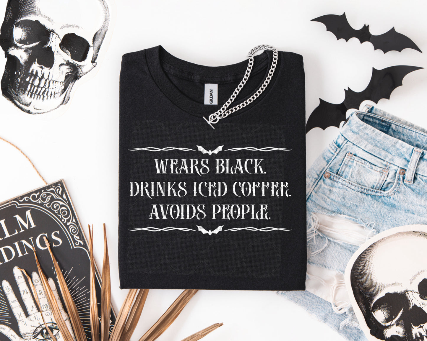 Wears Black Drinks Ice Coffee Avoids People