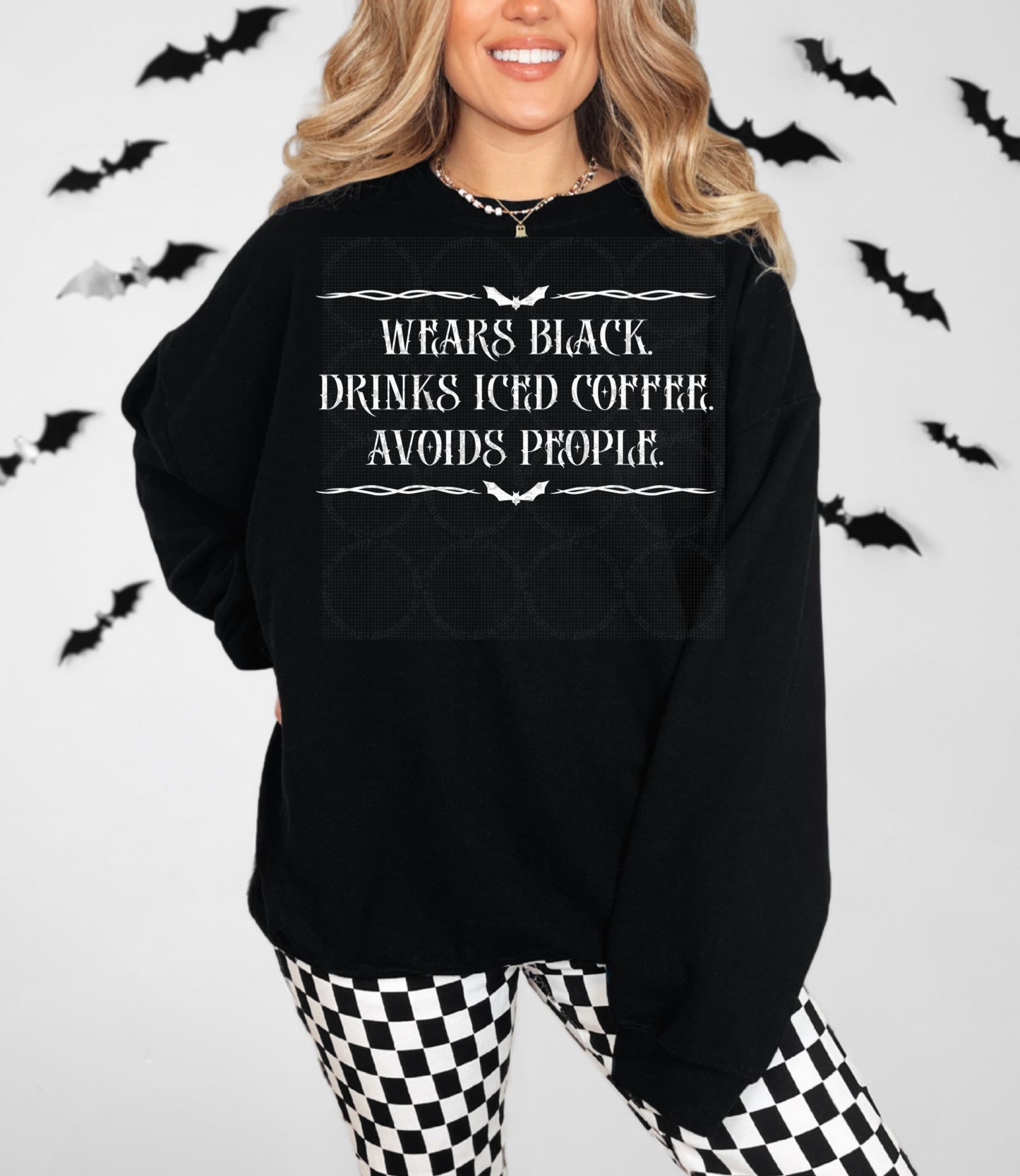 Wears Black Drinks Ice Coffee Avoids People